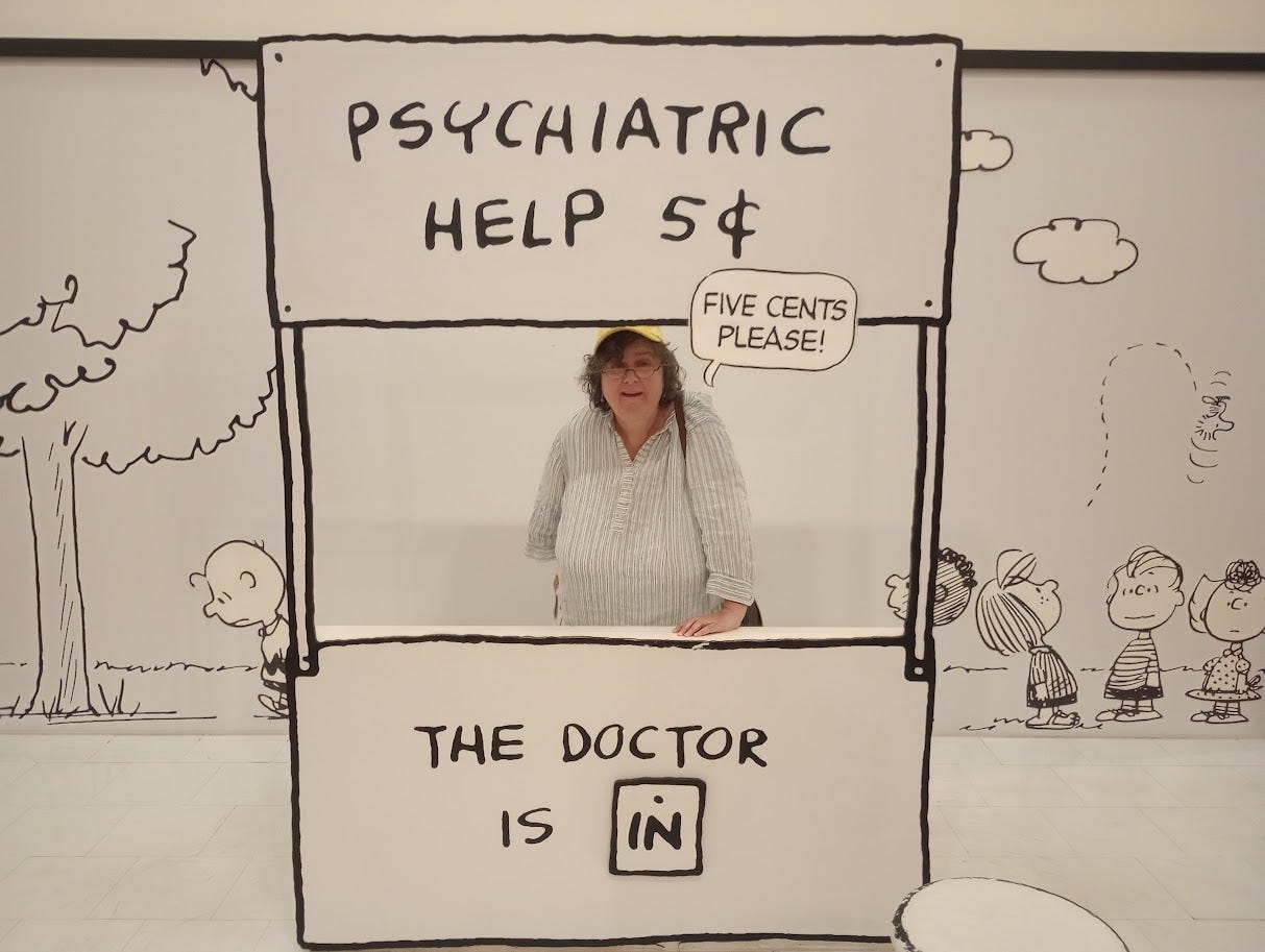 Annette at cartoon psychiatric help booth, same one as staffed by Lucy in Peanuts Annette at cartoon psychiatric help booth, same one as staffed by Lucy in Peanuts