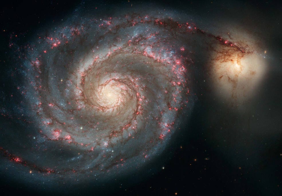 The Whirlpool Galaxy, by the Hubble Telescope