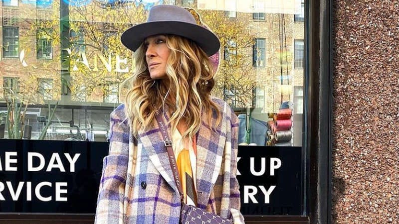 May be an image of 1 person, overcoat, suit, hat shop and text that says "ANE E DAY VICE plero UP RY"