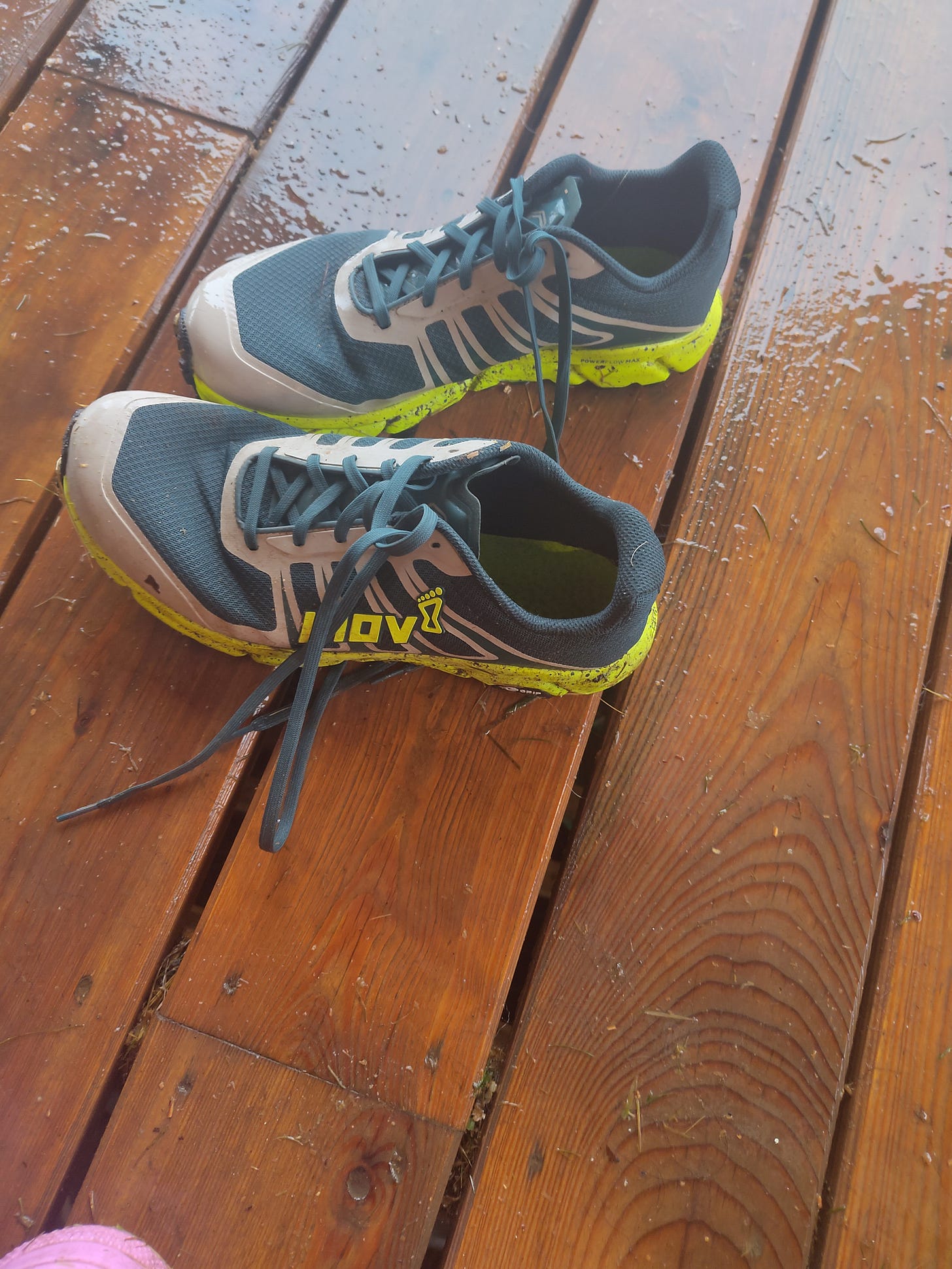 kicking pair of trainers