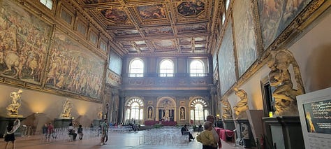Three photos showing Renaissance murals on the walls and ceiling of rooms in the Palazzo Vecchio in Florence.