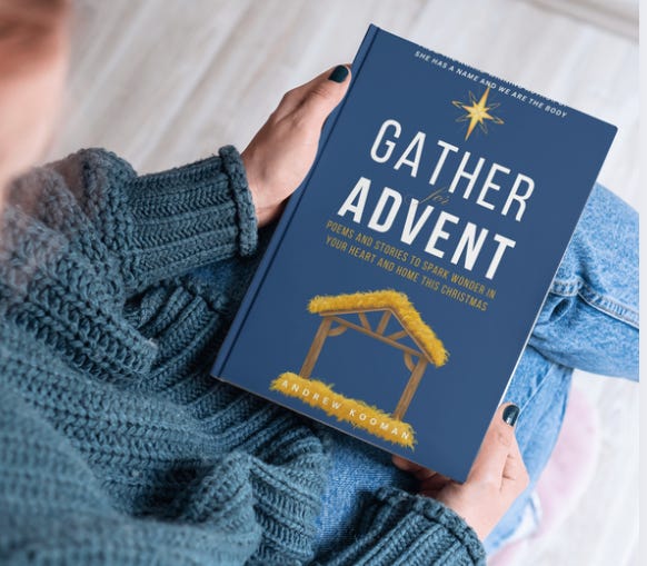 A woman holds the Christmas book Gather for Advent, by Andrew Kooman. The cover has a bright star over a manger.