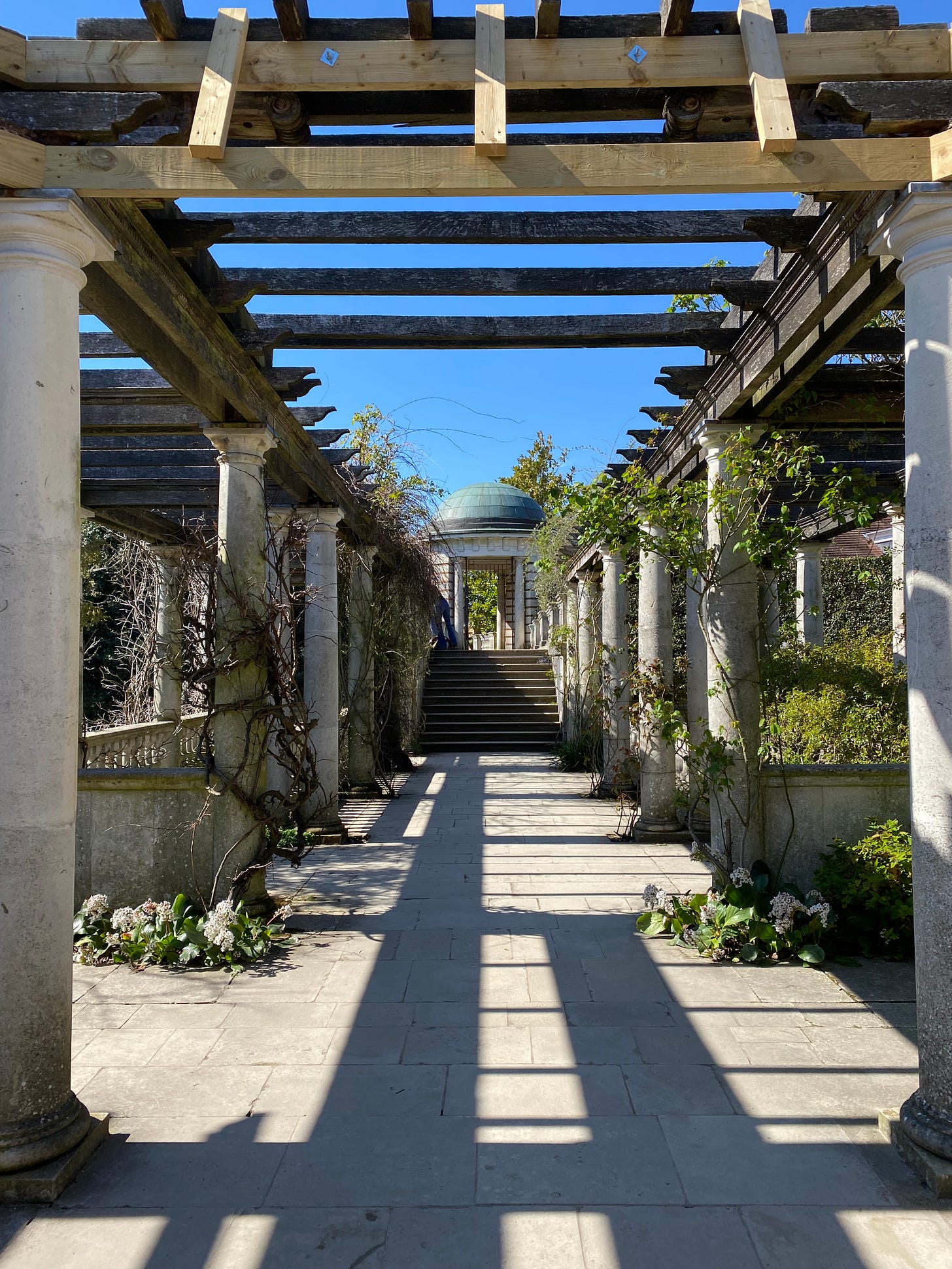 Pergola and domed garden building.