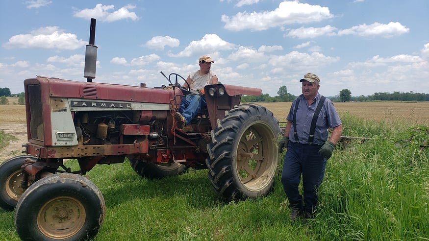 A photo of my husband Brett and my father-in-law Bob on the family farm in Knox County, Ohio