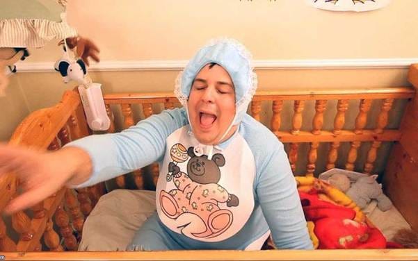 A person in a crib
AI-generated content may be incorrect. A person in a crib
AI-generated content may be incorrect.