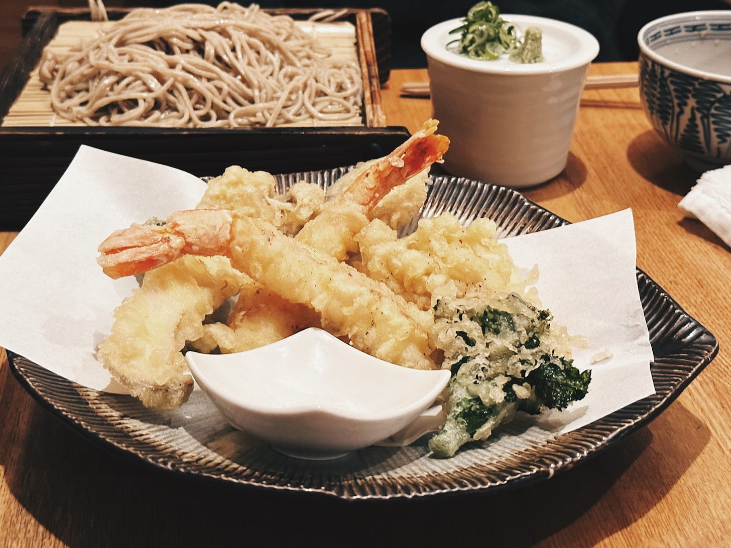 Soba noodles and tempura served on a traditional woven tray at Takamaya restaurant, Nara, Japan Soba noodles and tempura served on a traditional woven tray at Takamaya restaurant, Nara, Japan