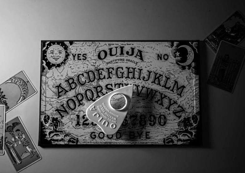 a picture of a key and some cards on a table a picture of a key and some cards on a table