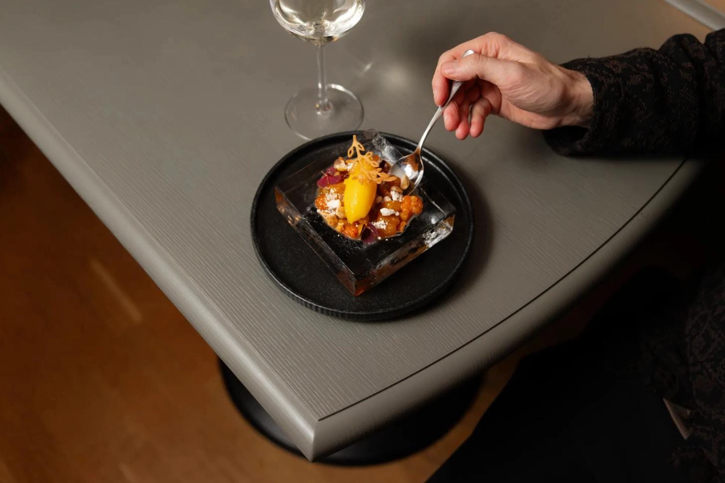Fine dining dish served at ICEHOTEL's Ice Restaurant in Swedish Lapland.