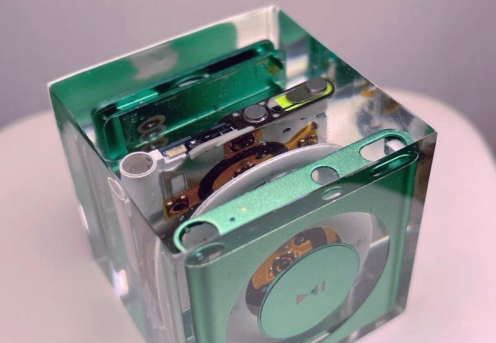Design in Resin: A rare glimpse into Apple's prototype stages. The iPod shuffle's control pad suspended in time.
