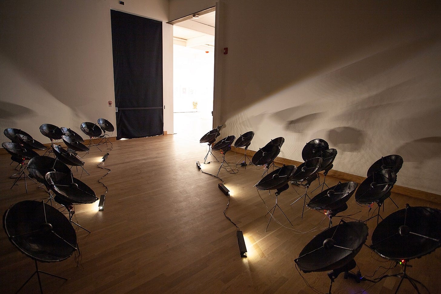 wide shot of the 27 dishes that make up the installation