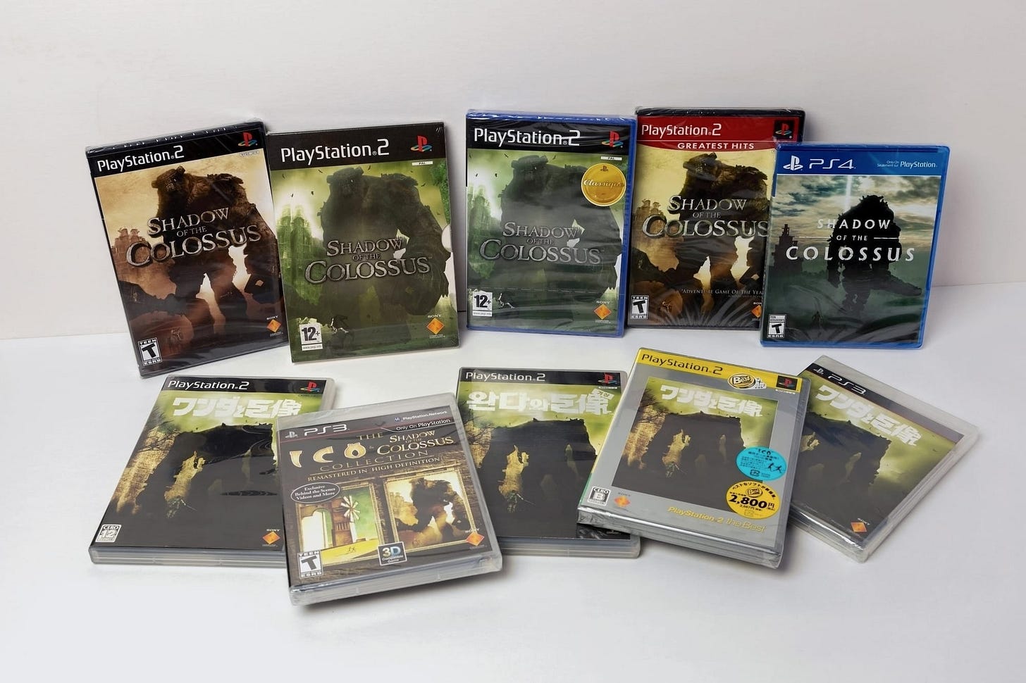 A photo shows 10 copies of Shadow of the Colossus, including versions from North America, Italy, Korea, and Japan.