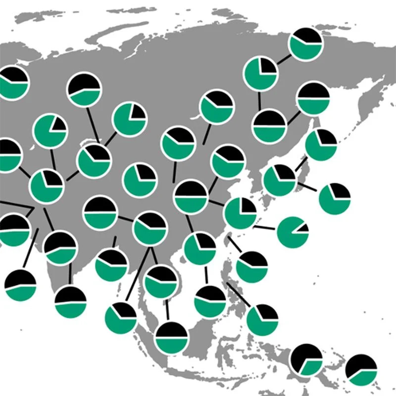 A world map covered with small pie charts representing human genetic diversity.