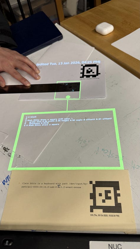 Photos of people around projectors and augmented pieces of paper from the Folk studio