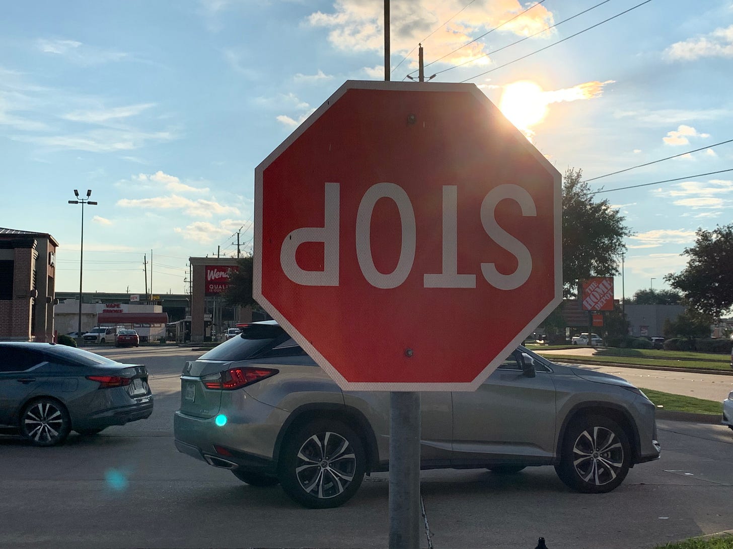 upside down roadside stop sign 