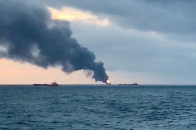 Smoke rises from a fire at a ship in the Kerch Strait near Crimea Smoke rises from a fire at a ship in the Kerch Strait near Crimea