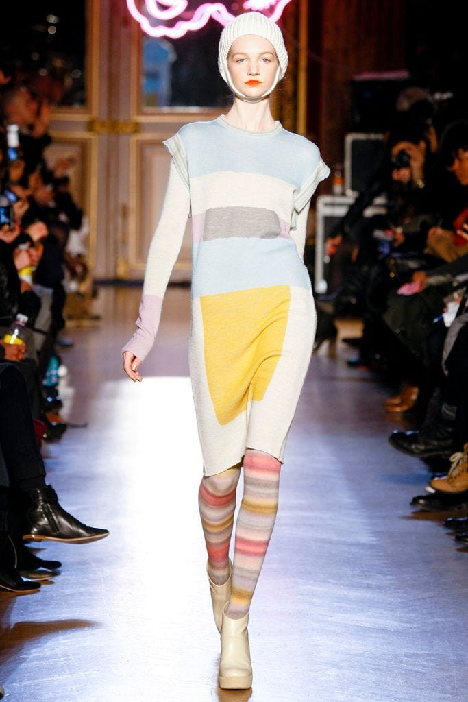 Image may contain Clothing Apparel Fashion Footwear Shoe Human Person and Runway