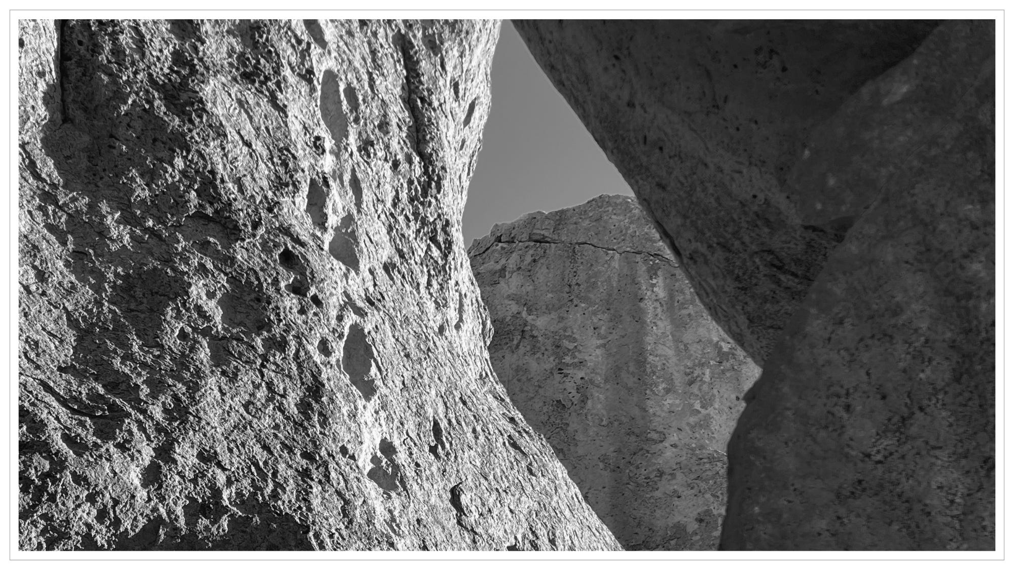 Monochrome; ancient, volcanic boulders