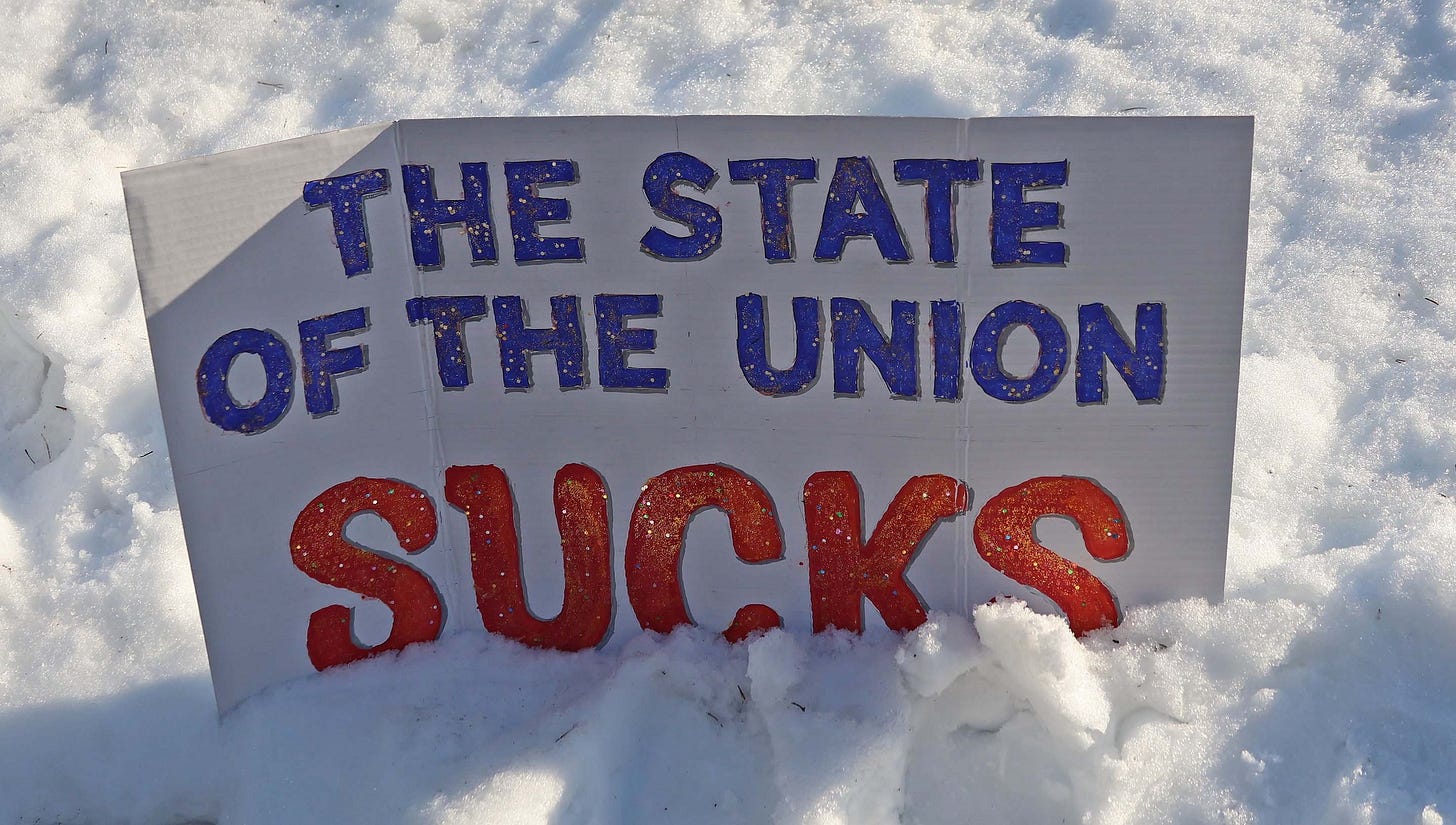 May be an image of text that says 'THE STATE OF THE UNION SUCKS CKS' May be an image of text that says 'THE STATE OF THE UNION SUCKS CKS'