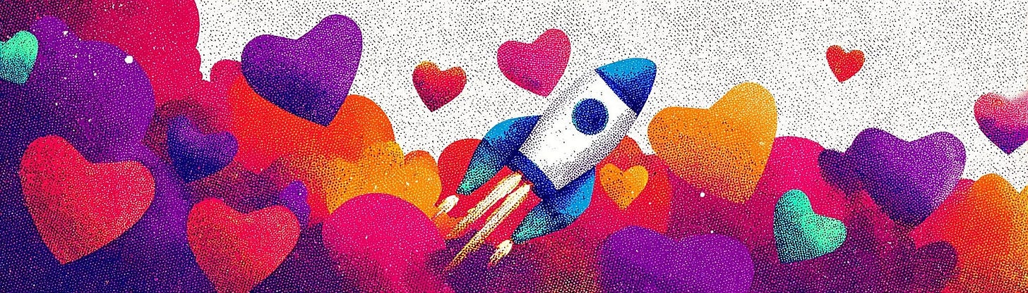 Colourful hearts in shades of red, purple, orange, and blue surround a white rocket ship taking off.