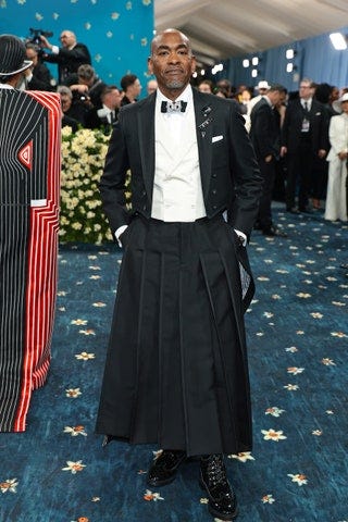 Image may contain Anthony David Colin David Jones Bear Pascoe Clothing Hat Adult Person Footwear and Shoe