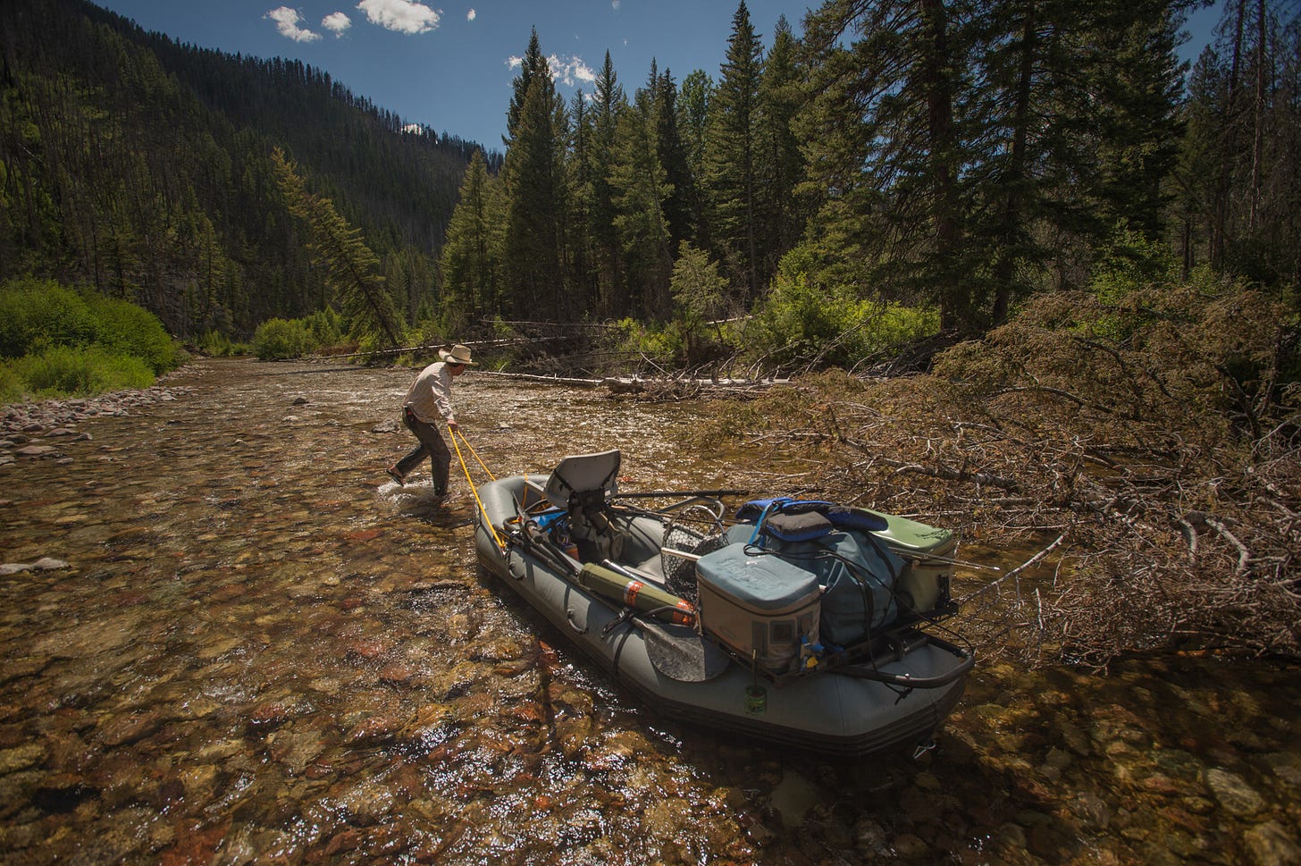 Dragging a summer raft–South Fork of the Flathead, MT.