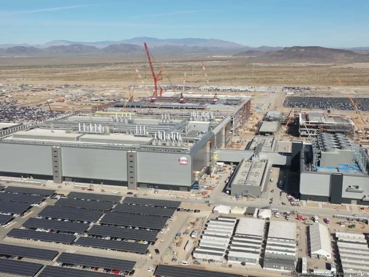 TSMC's Arizona semiconductor fabrication facility under construction, showcasing advanced manufacturing infrastructure and sustainable energy integration TSMC's Arizona semiconductor fabrication facility under construction, showcasing advanced manufacturing infrastructure and sustainable energy integration