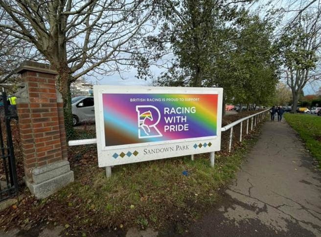 Sign at Sandown Park stating "Proud to support Racing With Pride"