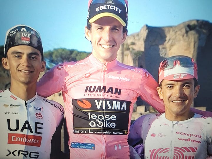 Yates, Del Toro and Carapaz on the podium, and Yates with the Giro trophy