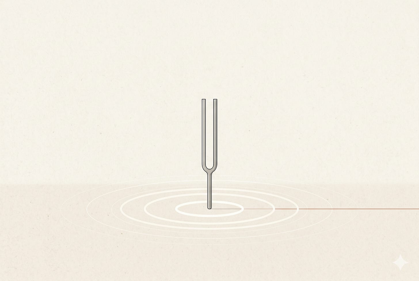 A silver tuning fork vibrating above concentric circles, with a thin red line passing through its center. A silver tuning fork vibrating above concentric circles, with a thin red line passing through its center.