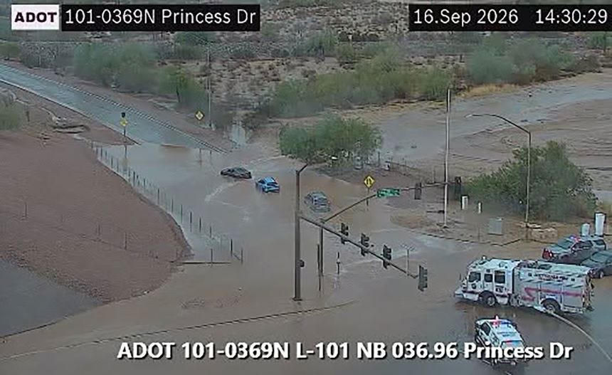 The Arizona Dept. of Transportation shared traffic cam images of flooded roadways near Phoenix amid heavy downpours on Wednesday.