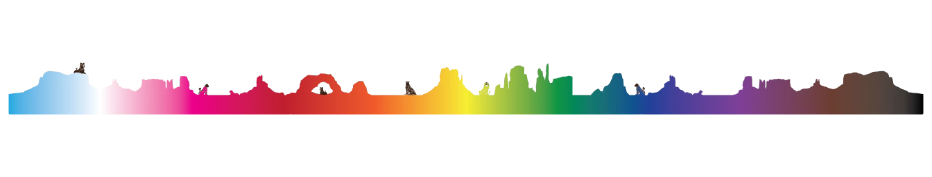 A vibrant scene shows a rainbow arching over a stylized landscape with canyon elements like buttes, rock arches, and bridges, reminiscent of Monument Valley. Lions and lionesses, some sitting and others lying relaxed, appear to enjoy the majestic setting. The rainbow transitions through colors—blue, white, light pink, red, orange, yellow, green, blue, violet, brown, and black—creating a dynamic, colorful backdrop.