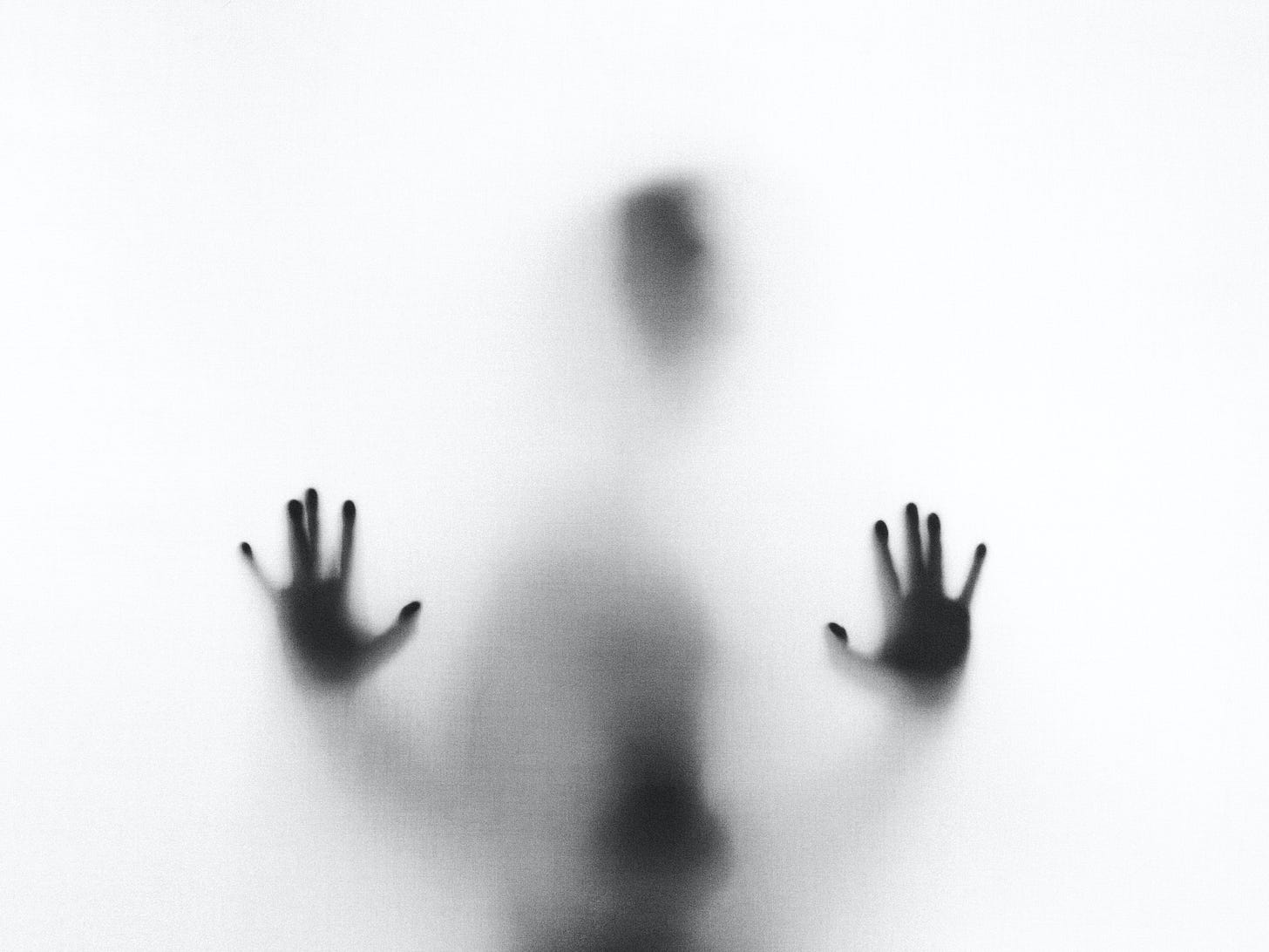 A photo of a person behind fog A photo of a person behind fog
