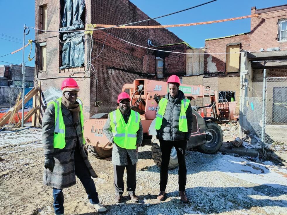 The ACANA team at the construction site of the Africa Center, which is set to be finished by 2026.