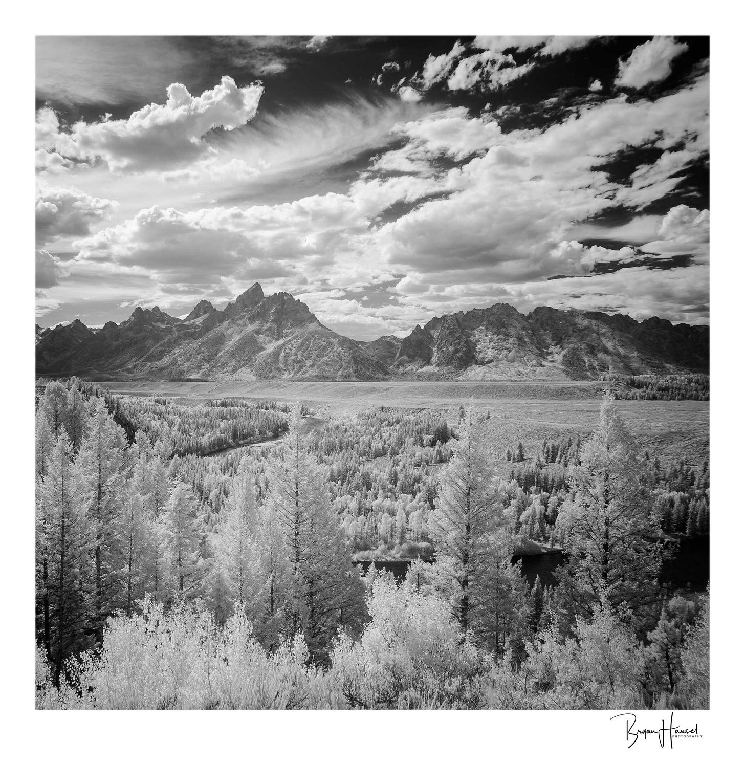 the snake river under the tetons and cloudy skies