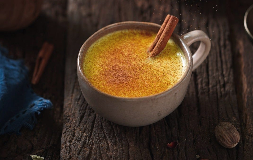 a teapot with a liquid in it a teapot with a liquid in it