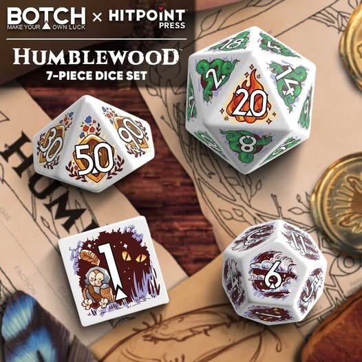 May be an image of text that says 'BOTCH MAKE YOUR OW OWN LUCK HITPOINT PRESS HUMBLEWOOD 7-PIECE DICE 7-PIECEDICESET SET 20 수 50 8 FACTION JeCos li V'