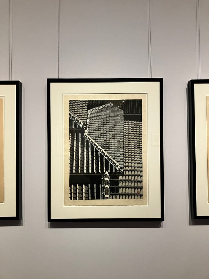 Two woodblock prints showing a weaver and tiled rooftops
