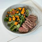 Creamy Caesar salad with grilled steak
