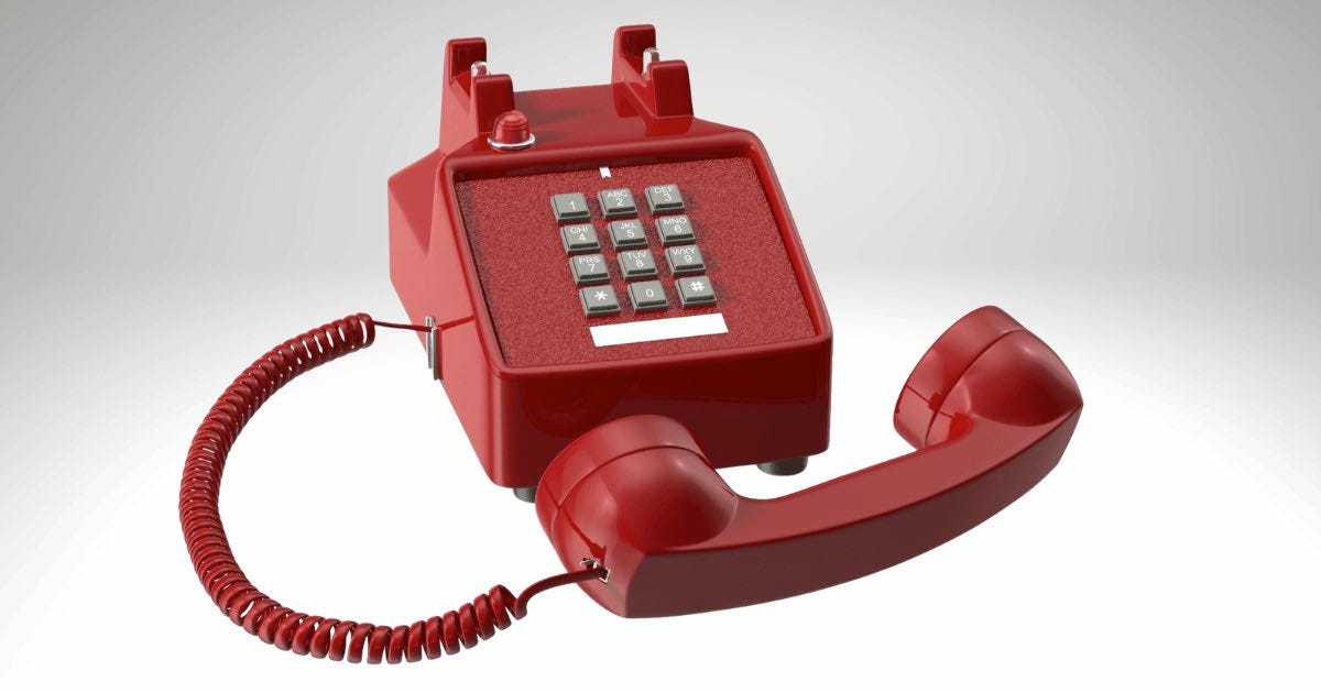 Red push button phone with receiver off hook Red push button phone with receiver off hook