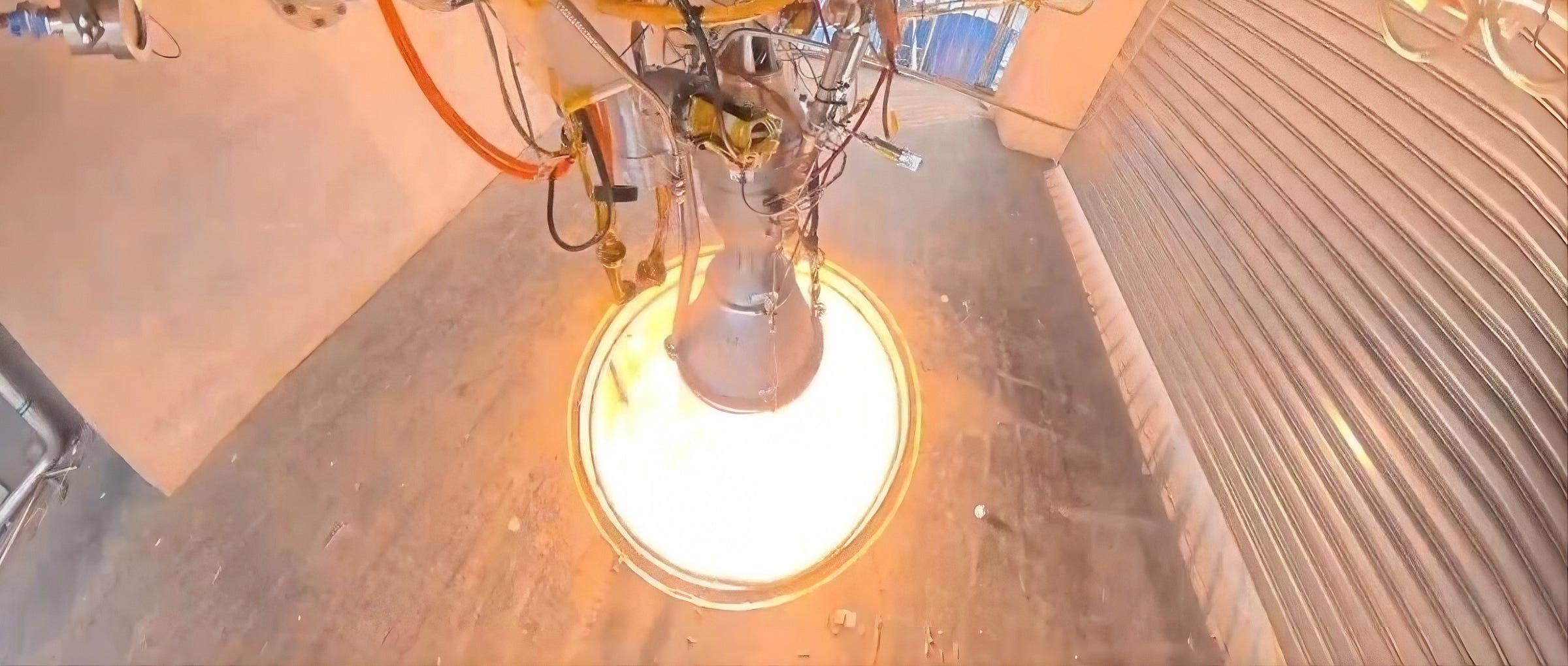 Spark Space’s electric-pump-fed cycle Lieyan-2 engine during its system-wide test in early 2026 on one of Deep Blue Aerospace’s test stands.