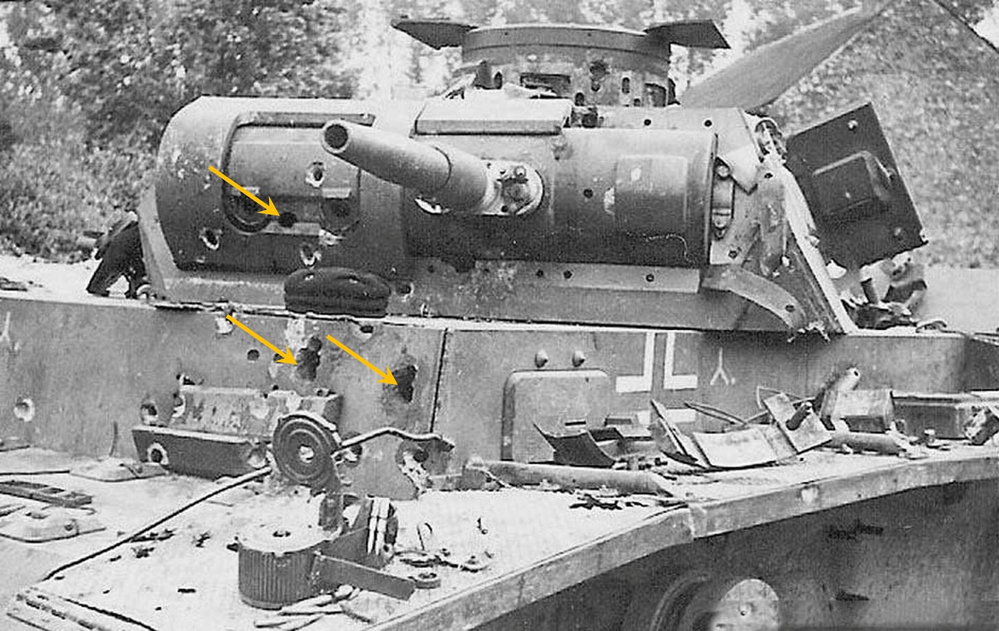 The first photo, but with 3 larger shell impacts highlighted by yellow arrows.