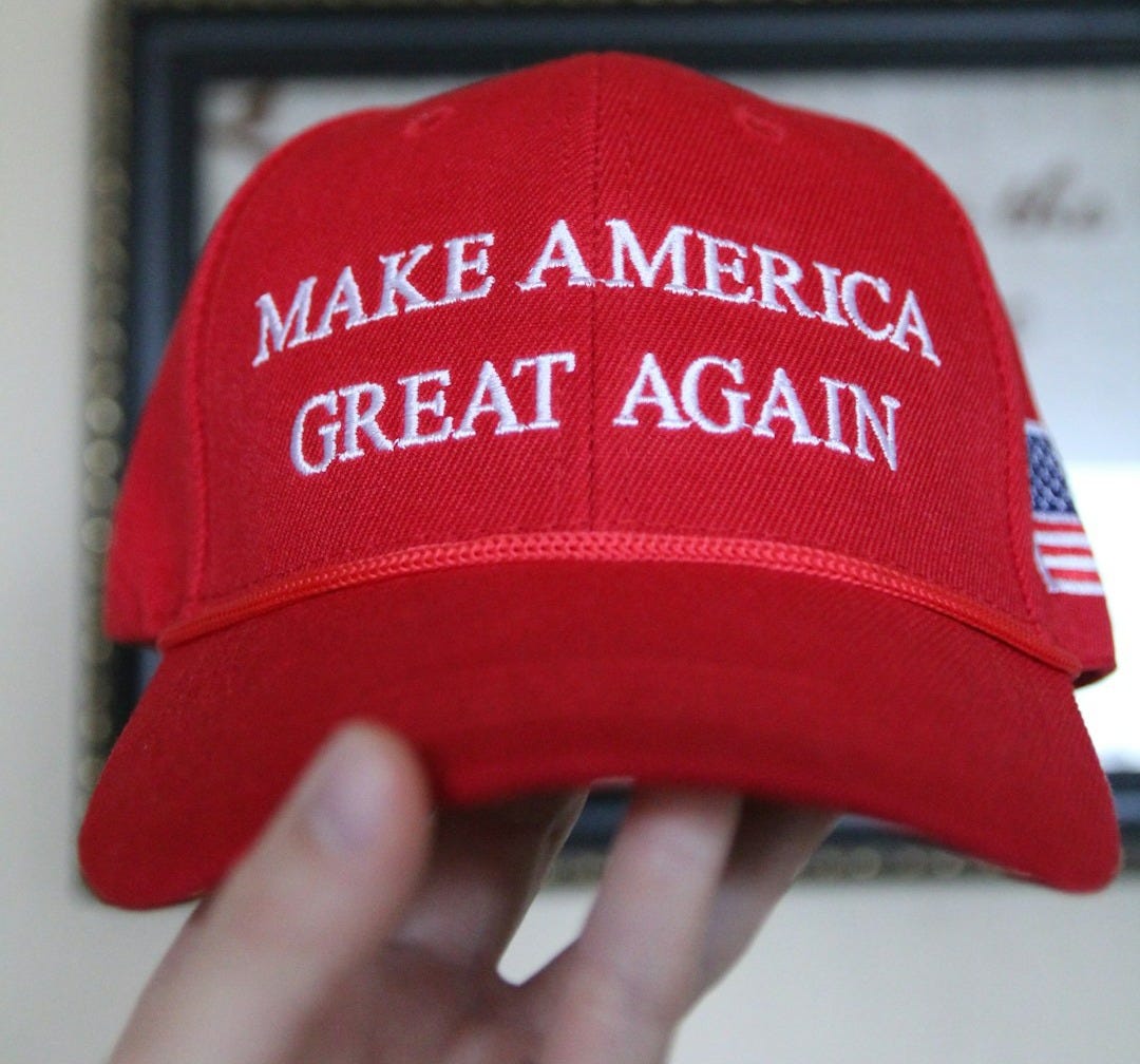 a red hat that says make america great again