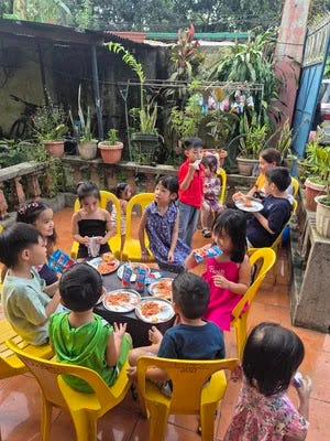 Rafa and the kids eating party food