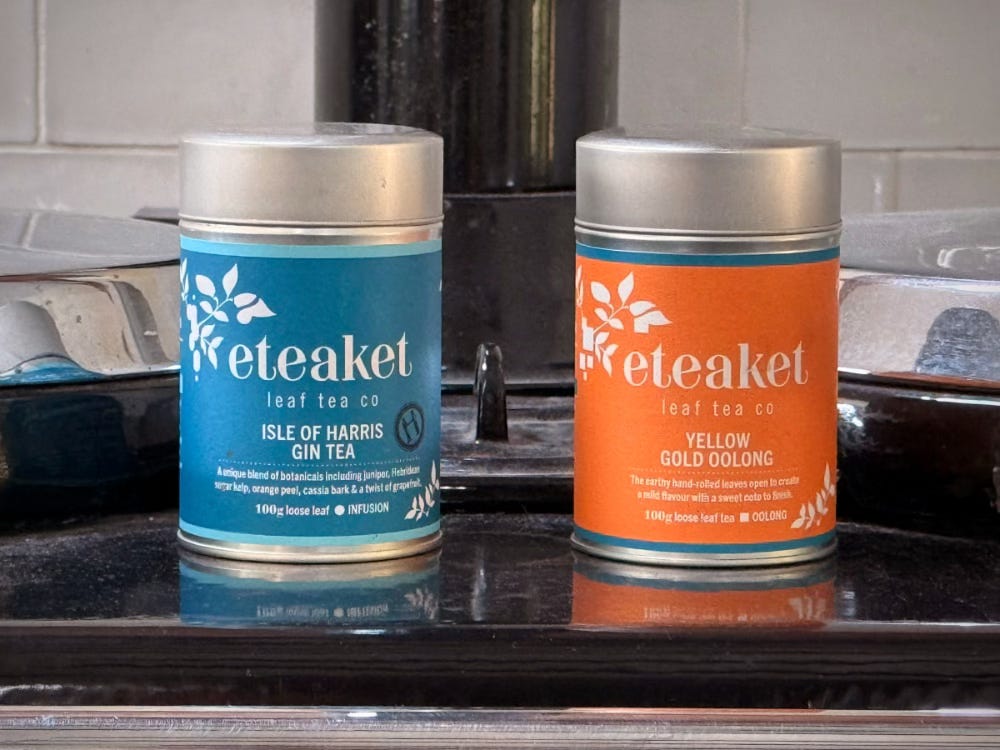 Two tins of fancy tea