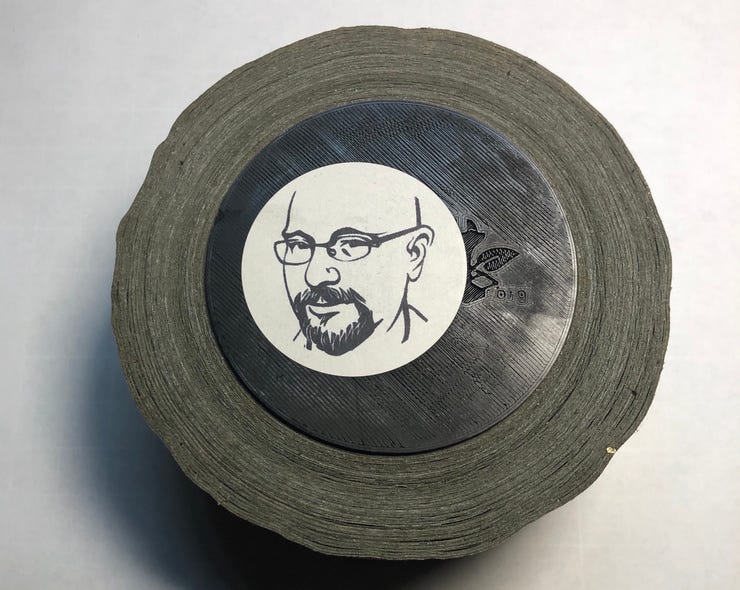 Turn a roll of duct tape into a container.