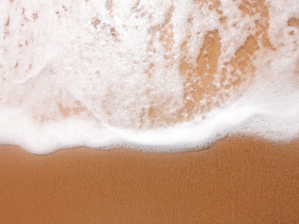 white and brown sand beach