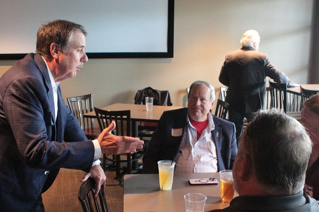 [Photo with caption] Brinker Harding speaks to guests.