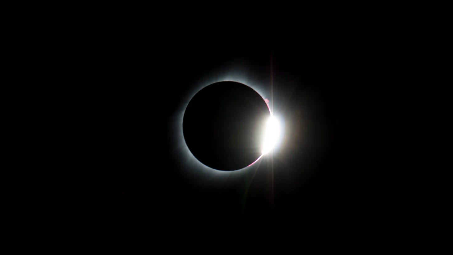 Solar eclipse, right as the moon begins to unblock the sunlight. 