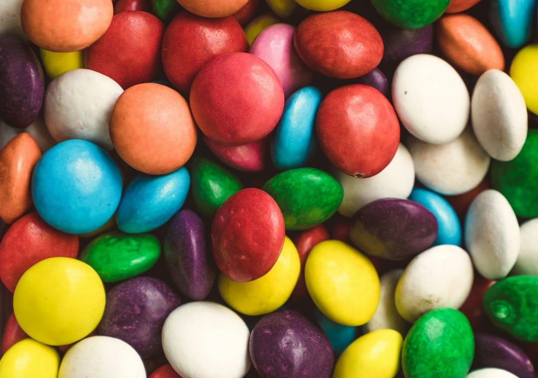 blue yellow and red m ms chocolates blue yellow and red m ms chocolates