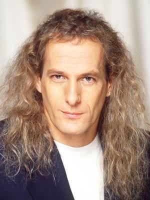 Michael Bolton with a mullet, circa 1990s